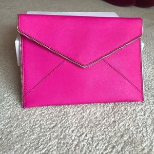 Pink Rebecca Minkoff envelope clutch